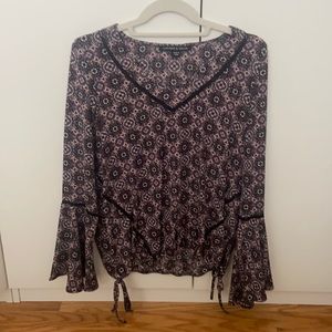 Purple long sleeve blouse.